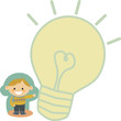 boy pointing to a light bulb