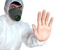 Photo: man in protective overalls and respirator man in protective overalls and respirator