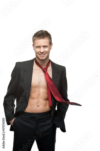 Photo: sexy smiling businessman in red tie sexy smiling businessman in red tie