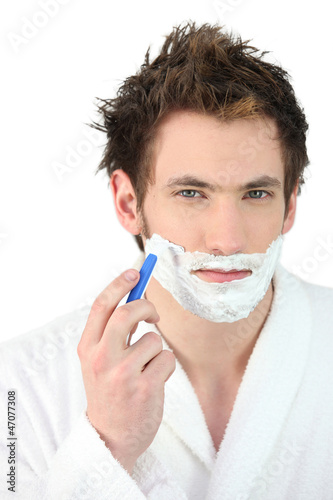 Photo: Man shaving his beard Man shaving his beard