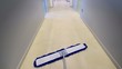 Timelapse of professional cleaner wiping floor in office