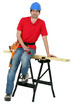 Carpenter sitting on a workbench