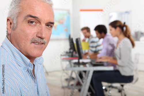 Photo: A teacher in his classroom A teacher in his classroom