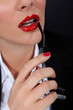 Sexy woman with red glossy lipstick