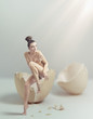 Young beauty in eggshell