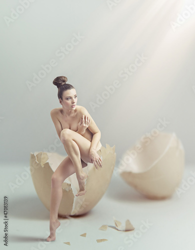 Photo: Young beauty in eggshell Young beauty in eggshell