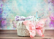 Small wicker basket with colorful background