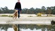 Woman is playing with her dog