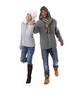 Happy couple hand in hand at wintertime smiling