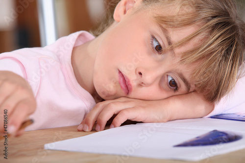 Photo: tired schoolgirl tired schoolgirl