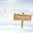 Wooden sign in a winter landscape