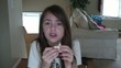 Girl Eating, Talking, & Laughing at Table