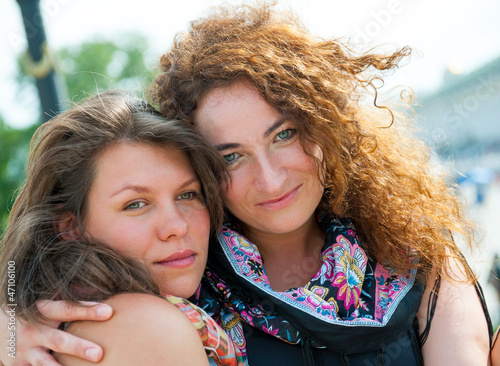 Photo: Two happy young beautiful women Two happy young beautiful women