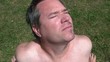 Half Shaven Man Suntanning