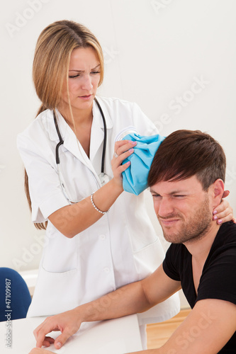 Photo: Cold pack applied to head Cold pack applied to head