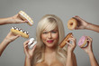 woman eating cream cakes