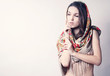 beautiful naked girl in a beautiful scarf