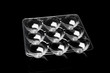 egg container isolated on black