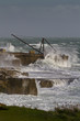 Storm waves breaking over a crane, Portland Bill, Dorset,UK