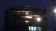 Late at night, there is building a building on the rive