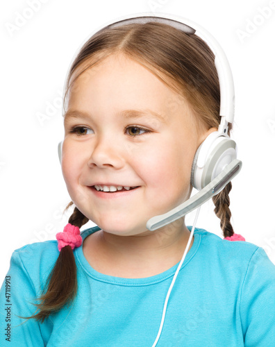 Photo: Young girl is working as an operator at helpline Young girl is working as an operator at helpline