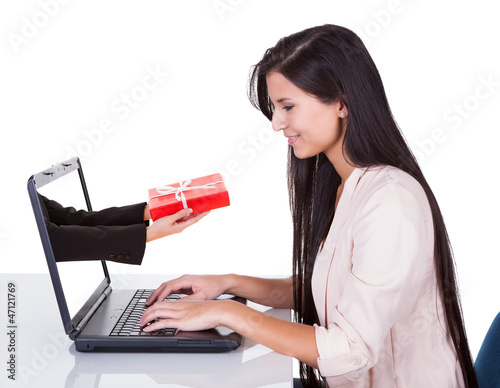 Photo: Woman doing online shopping or banking Woman doing online shopping or banking