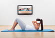 Athletic woman working out at home
