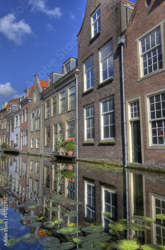 Photo: Houses on a canal in Delft Houses on a canal in Delft