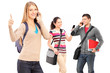 A happy male and female student using a mobile phones