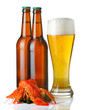 Bottles and cup of light beer and lobsters heap isolated
