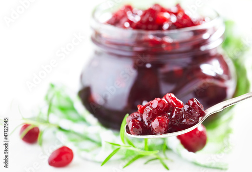 Photo: Cranberry sauce in glass jar Cranberry sauce in glass jar