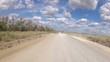 Vehicle point-of-view driving on a dirt road