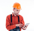 Photo: A builder with a tablet A builder with a tablet