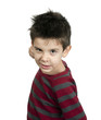 Little boy threatens with a fist to fight