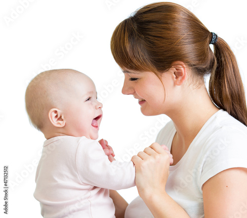 Photo: Loving mother playing with her baby Loving mother playing with her baby
