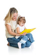 Foto: happy mother and child reading a book together happy mother and child reading a book together