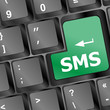 Social media key with SMS text on laptop keyboard