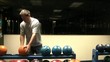 Man Picking Out Bowling Ball