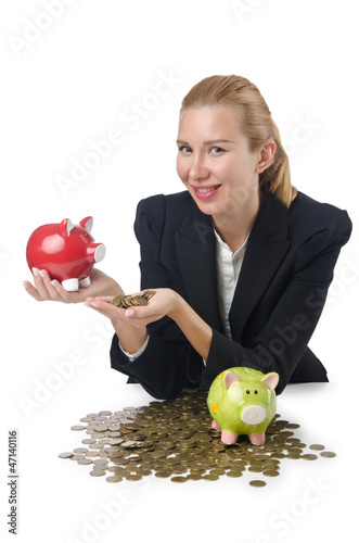 Photo: Woman breaking piggy bank for savings Woman breaking piggy bank for savings
