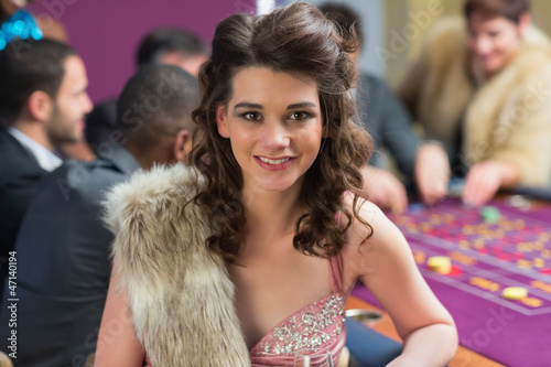 Photo: Smiling woman at roulette table Smiling woman at roulette table