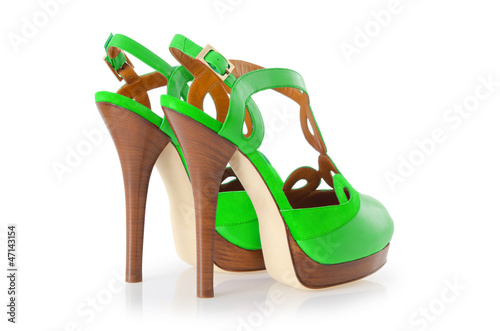 Photo: Woman shoes isolated on white Woman shoes isolated on white