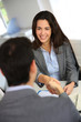 Photo: Business partners shaking hands after meeting Business partners shaking hands after meeting