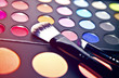multi colored make-up and brush