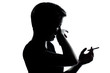 one young teenager boy or girl smoking cigarette disgust silhoue