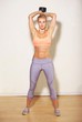 Athletic Woman Lifting a Dumbbell