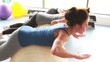 Women doing press ups on exercise balls