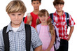 Schoolchildren with bags