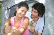 Couple camping in tent