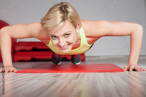 Photo: woman doing fitness exercise woman doing fitness exercise