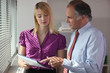 Personal assistant asking her boss a question